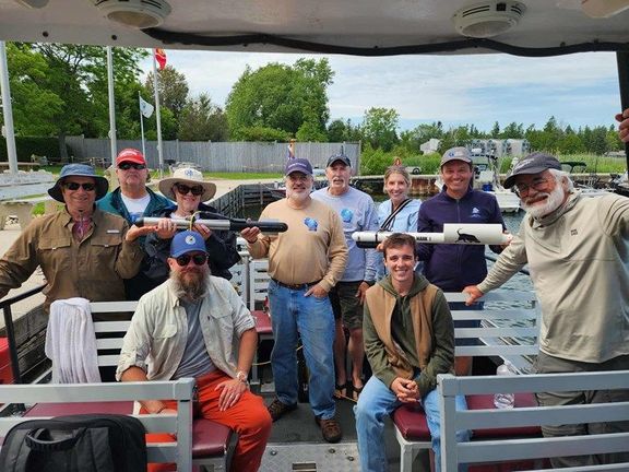 Na snímku (zleva doprava): Robert Jaeck, Bob Ryan, Lisa Gibson, Matt Ludvigson, Brendon Baillod, David Siegel, Lio O'Shasky, Caitlin Looby, Kevin Cullen.