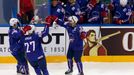 France's Laurent Meunier (C) celebrates his goal against the Czech Republic with team mates during the first period of their men's ice hockey World Championship Group A g