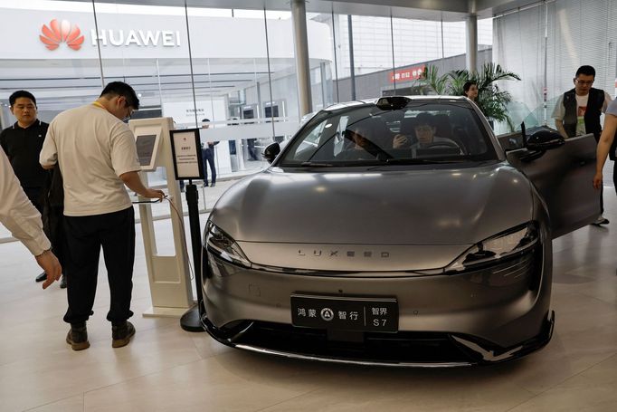 A Luxeed S7 electric sedan, developed by Huawei and Chery Aut, is displayed at Huawei's booth at the Beijing International Automotive Exhibition, or Auto China 2024, in B