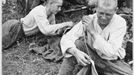 STALINGRAD - REPAIRS Soviet troops rest behind the front line and make repairs to their uniforms. Date: 1942-43 Source: Unattributed photograph MELEDIN COLLECTION