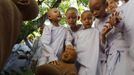 Novice Thai nuns play at the Sathira Dammasathan Buddhist meditation centre in Bangkok