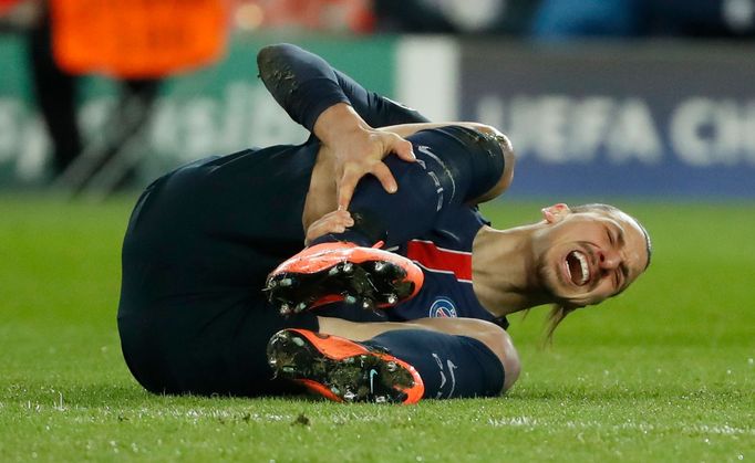 Paris St Germain's Zlatan Ibrahimovic lies injured