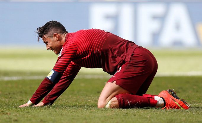 Portugal's Cristiano Ronaldo reacts after missing a shot during their 2014 World Cup Group G soccer match against Ghana at the Brasilia national stadium in Brasilia June