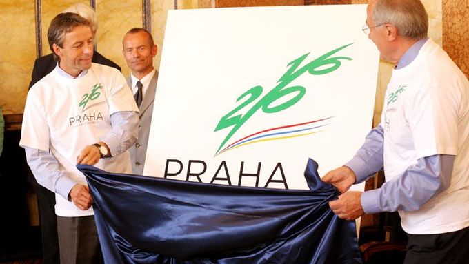 What have we got here? Let's see... (Mayor of Prague Pavel Bém and Czech Olympic Committee chairman Milan Jirásek unveiling the Prague Olympic logo)