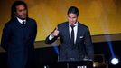 Real Madrid's James Rodriguez of Colombia gives a thumbs-up after receiving FIFA Puskas Award as former French player Christian Karembeu (L) looks on during the FIFA Ball