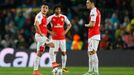 Arsenal's Alexis Sanchez and Mesut Ozil look dejected after Neymar scored the first goal for Barcelona