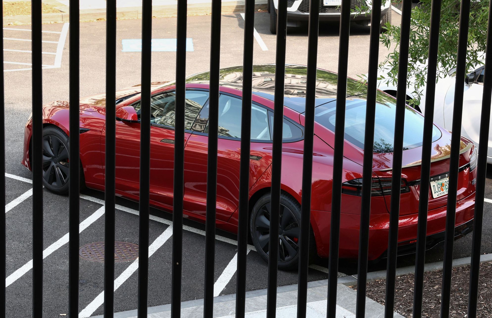 A Tesla is parked at the White House in Washington