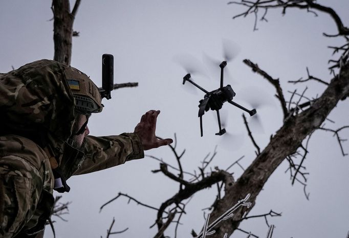 Ukrainian serviceman launches a kamikaze FPV drone at a front line, amid Russia's attack on Ukraine, near the city of Bakhmut in Donetsk region, Ukraine December 12, 2023