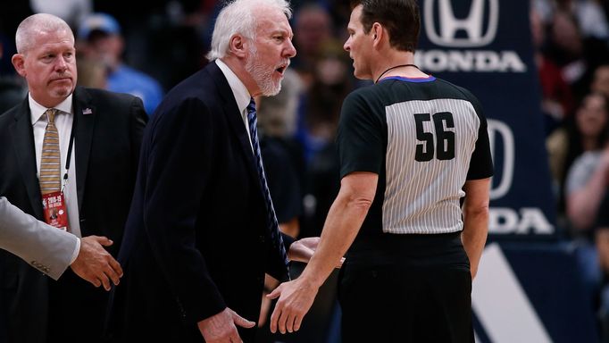 Apr 3, 2019; Denver, CO, USA; San Antonio Spurs head coach Gregg Popovich argues a call with referee Mark Ayotte (56) and is ejected in the first quarter against the Denv