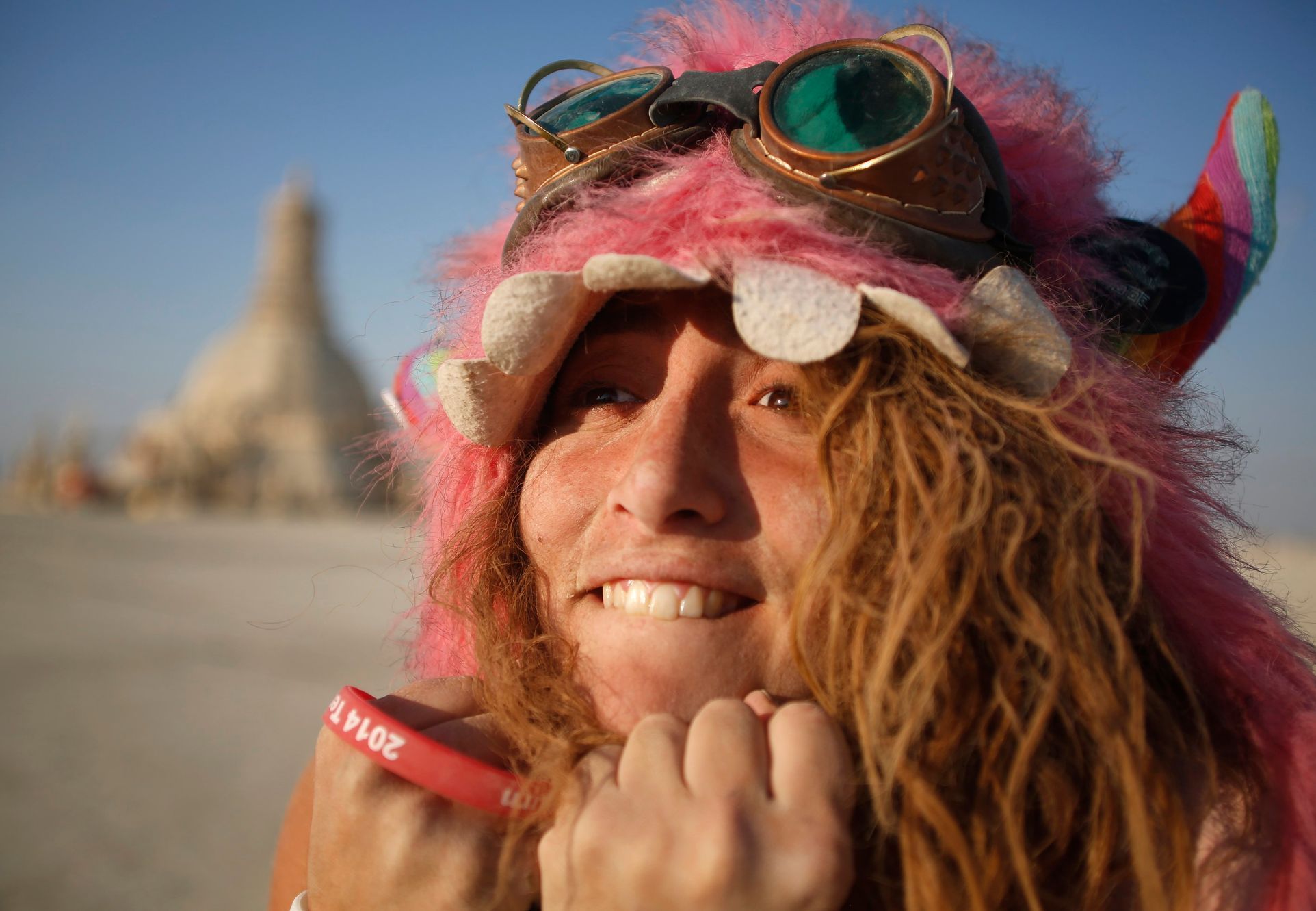 Participant Sandy Candy before the Temple of Grace burns on the last day of the Burning Man 2014 &quot;Caravansary&quot; arts and music festival in the Black Rock Desert of Nevada