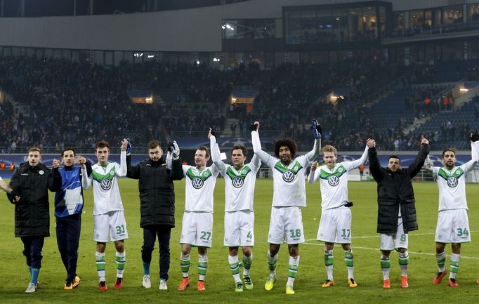 VfL Wolfsburg's players celebrate after winning against KAA Gent.