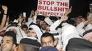 Protesters shout slogans outside the U.S. embassy in Bayan September 13, 2012. Demonstrations spread further on Thursday, with U.S. embassies again the targets of popular anger among Muslims questioning why the United States has failed to take action against the makers of a film they consider blasphemous to Islam. Around 200 demonstrators shouted slogans outside the U.S. embassy in Kuwait as riot police encircled the crowd of men protesting peacefully in their traditional Kuwaiti dress.