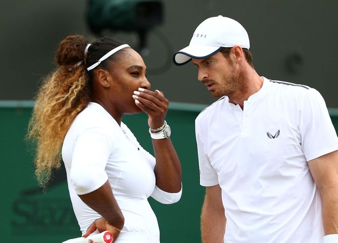 Tennis - Wimbledon - All England Lawn Tennis and Croquet Club, London, Britain - July 10, 2019  Serena Williams of the U.S. and Britain's Andy Murray during their third r