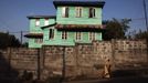 Painted wooden planks cover facade of traditional colonial-era Board House on King Street in Sierra Leone's capital Freetown