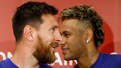 FILE PHOTO: FC Barcelona players Lionel Messi and Neymar attend a news conference to announce the sponsorship deal between the team and Rakuten Inc. in Tokyo