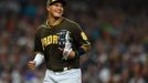 Jul 26, 2019; San Diego, CA, USA; San Diego Padres third baseman Manny Machado (13) laughs at the end of the top of the eighth inning after throwing out San Francisco Gia