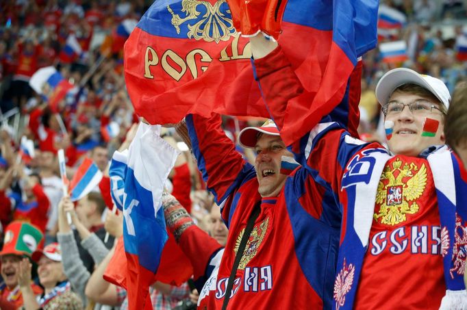 Russia's fans cheer during the first period of their men's ice hockey World Championship final game against against Finland at Minsk Arena in Minsk May 25, 2014. REUTERS/