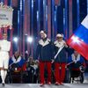 Russia's flag-bearer Redkozubov leads his country's contingent during the opening ceremony of the 2014 Paralympic Winter Games in Sochi