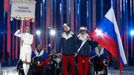 Russia's flag-bearer Valerii Redkozubov (R), leads his country's contingent during the opening ceremony of the 2014 Paralympic Winter Games in Sochi, March 7, 2014. REUTE