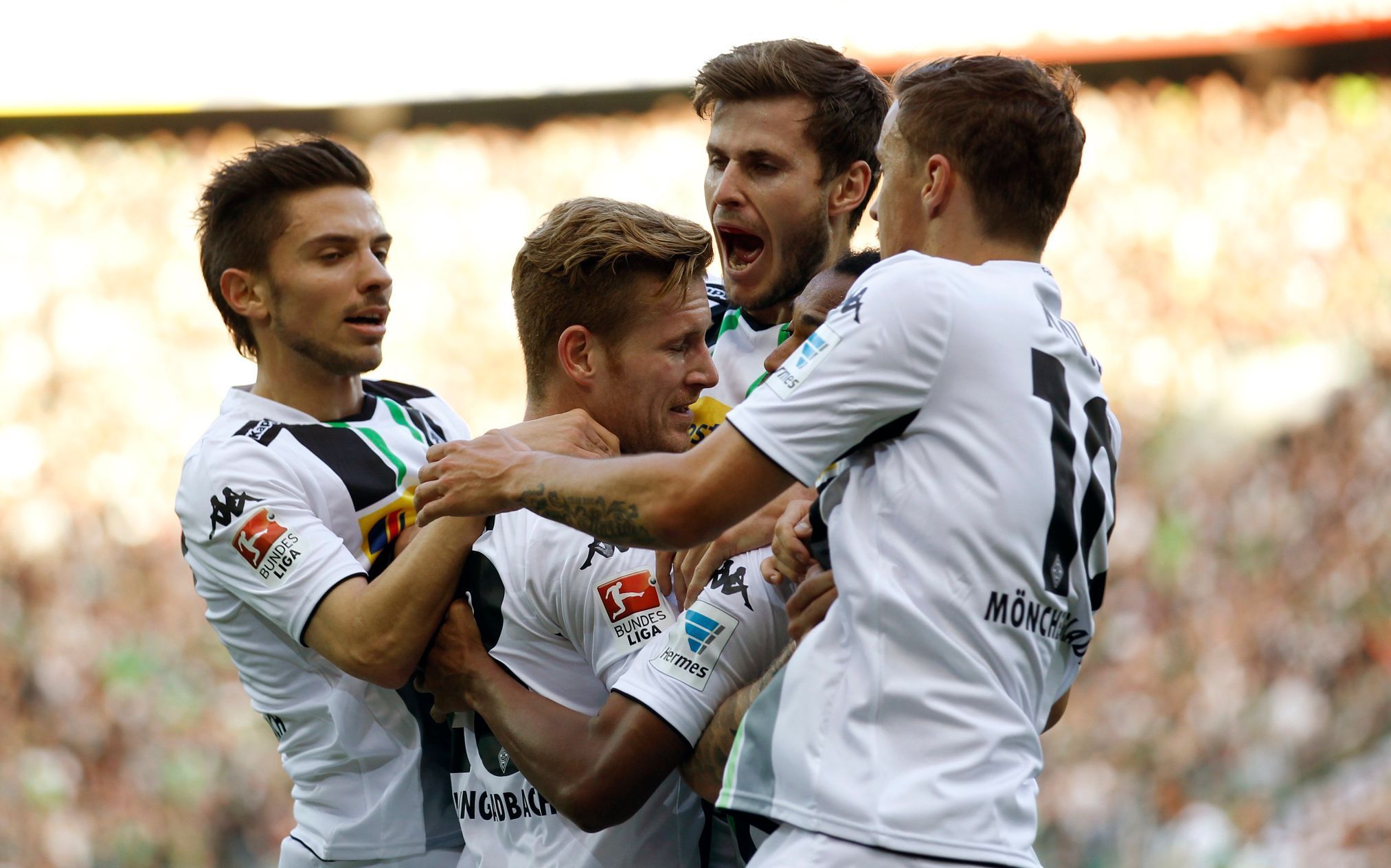 Borussia Mönchengladbach's Korb, Hahn, Nordtveit and Kruse celebrate a goal against Hoffenheim during the Bundesliga first division soccer match in Moenchengladbach