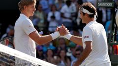 Kevin Anderson a Roger Federer po čtvrtfinále Wimbledonu 2018