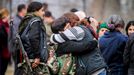 Female fighters of the Kurdish People's Protection Units (YPG) meet with their relatives at a military camp in Ras a-Ain, January 30, 2015.