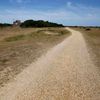 A gravel path lies on the former Royal Air Force base of Greenham Common