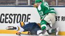 Jan 1, 2020; Dallas, TX, USA; Dallas Stars center Mattias Janmark (13) battles for the puck with Nashville Predators defenseman Dante Fabbro (57) during the first period