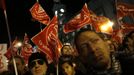 People attend a union rally on the eve of a general strike at Madrid's Puerta del Sol square November 13, 2012. Spain's two largest labour unions have called for a general strike on November 14, the second against the conservative government since they took power in December and coinciding with industrial action in Portugal on the same day. REUTERS/Susana Vera (SPAIN - Tags: BUSINESS EMPLOYMENT CIVIL UNREST POLITICS) Published: Lis. 13, 2012, 9:20 odp.