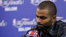 San Antonio Spurs' Tony Parker reacts as he speaks to the media after Game 7 in which his team was defeated by the Miami Heat in their NBA Finals basketball playoff in Mi