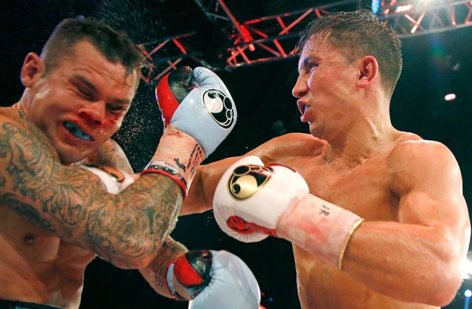 World champion Gennadiy Golovkin of Kazakhstan (R) punches Martin Murray of England during the WBA-WBC-IBO Middleweight World Championship in Monte Carlo, early February