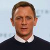 Actor Daniel Craig poses on stage during an event to mark the start of production for the new James Bond film &quot;Spectre&quot; at Pinewood Studios