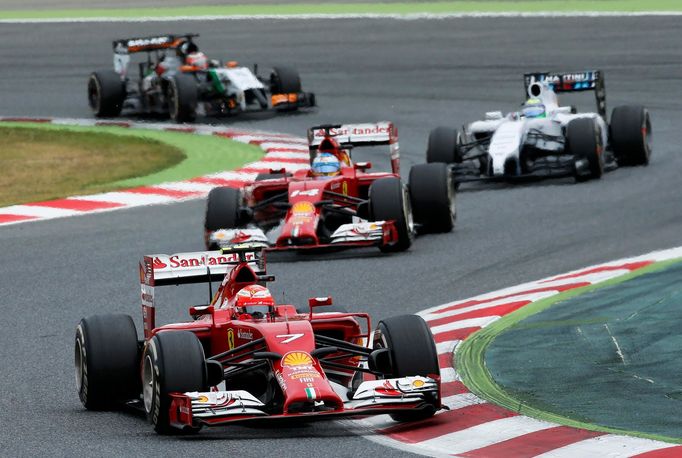 Ferrari Formula One driver Kimi Raikkonen of Finland steers during the Spanish F1 Grand Prix at the Barcelona-Catalunya Circuit in Montmelo, May 11, 2014. REUTERS/Albert