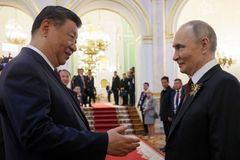 Červený koberec pro Putina. V Číně ladí strategii s protiváhou Západu