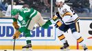 Jan 1, 2020; Dallas, TX, USA; Dallas Stars center Radek Faksa (12) chases the puck with Nashville Predators defenseman Matt Irwin (52) during the second period in the 202