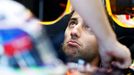 Red Bull Formula One driver Daniel Ricciardo of Australia looks up from his car in the team garage during the first practice session of the Australian F1 Grand Prix at th