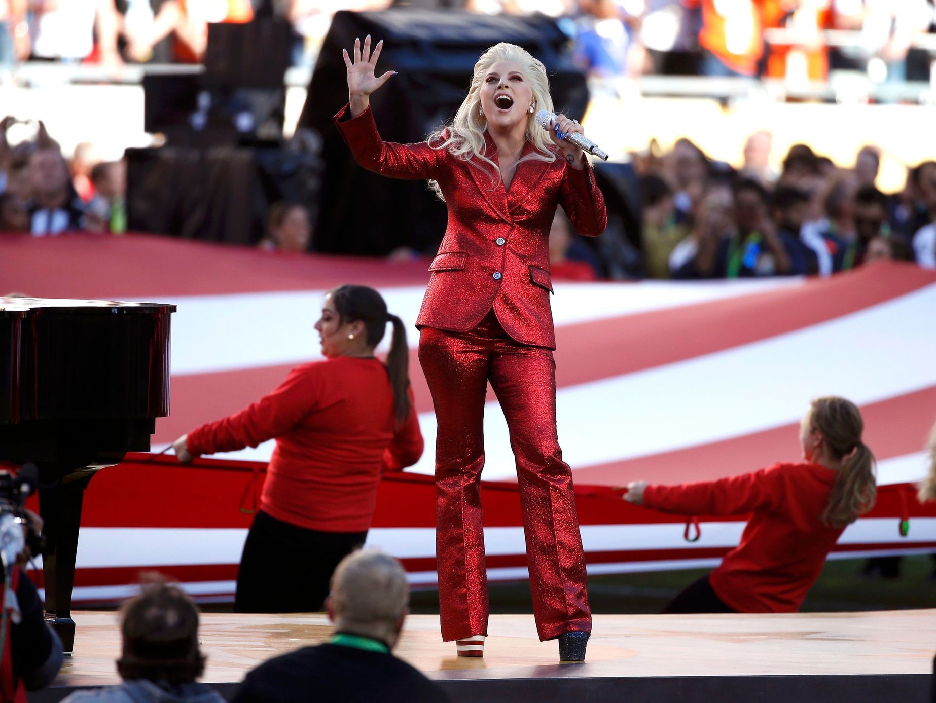 Lady Gaga sings the U.S. National Anthem before the start of the NFL's Super Bowl 50 between the Carolina Panthers and the Denver Broncos in Santa Clara