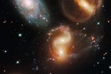 Skupina pětice galaxií zvaná Stephanův kvintet objevená v roce 1877 Edouardem M. Stephanem.