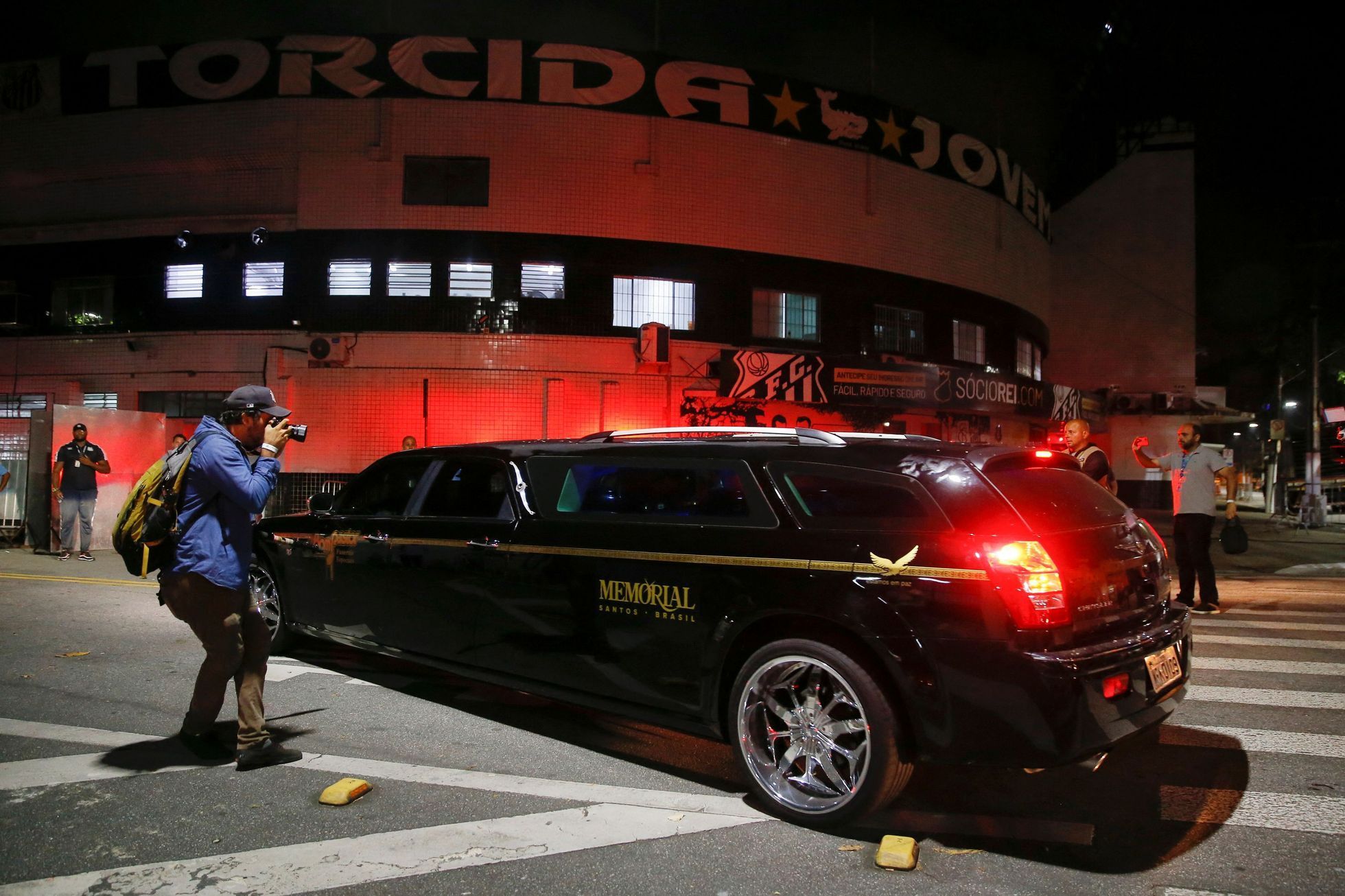 Fans around the Vila Belmiro stadium on the eve of Pele's funeral, in Santos
