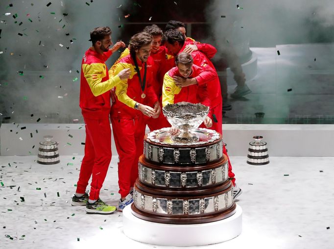 Tennis - Davis Cup Finals - Final - Caja Magica, Madrid, Spain - November 24, 2019   Spain's Rafael Nadal celebrates with the trophy and team mates after winning the Davi