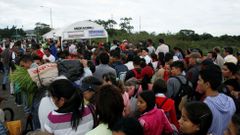 Venezuelané na hranici s Kolumbií