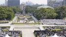 Doves fly over the Peace Memorial Park with a view of the gutted atomic-bomb dome at a ceremony in Hiroshima August 6, 2013, on the 68th anniversary of the world's first atomic bombing on the city. Mandatory Credit. REUTERS/Kyodo (JAPAN - Tags: ANNIVERSARY CONFLICT) ATTENTION EDITORS - THIS IMAGE HAS BEEN SUPPLIED BY A THIRD PARTY. IT IS DISTRIBUTED, EXACTLY AS RECEIVED BY REUTERS, AS A SERVICE TO CLIENTS. FOR EDITORIAL USE ONLY. NOT FOR SALE FOR MARKETING OR ADVERTISING CAMPAIGNS. MANDATORY CREDIT. JAPAN OUT. NO COMMERCIAL OR EDITORIAL SALES IN JAPAN. YES Published: Srp. 6, 2013, 1:40 dop.