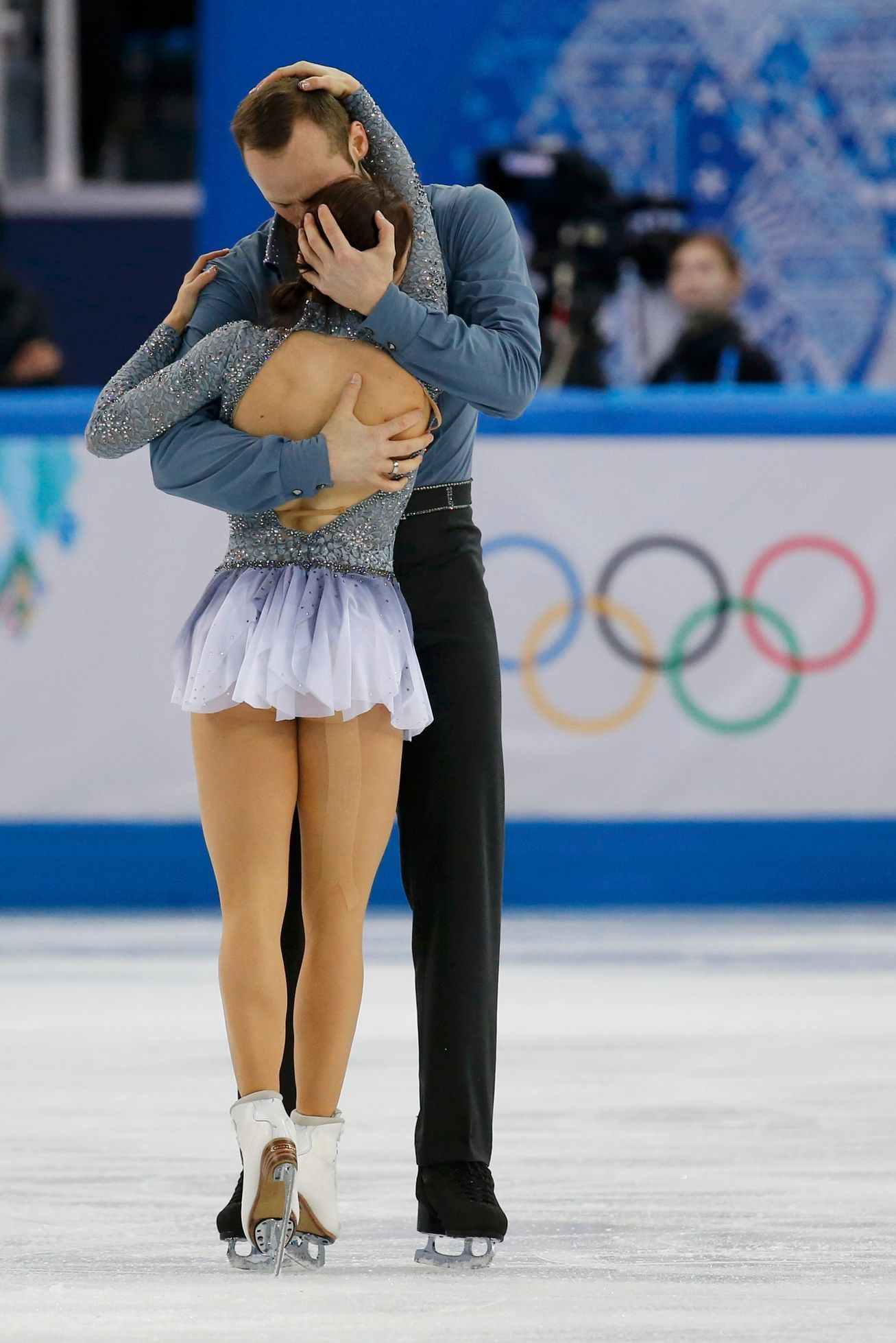 Daniel Wende and Maylin Wende of Germany embrace at the end of their performance during the Team Pairs Short Program at the Sochi 2014 Winter Olympics