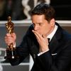 Writer Moore accepts the Oscar for best adapted screenplay for the film &quot;The Imitation Game&quot; during the 87th Academy Awards in Hollywood