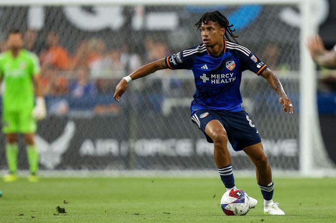 Jul 27, 2023; Cincinnati, OH, USA; FC Cincinnati midfielder Marco Angulo (8) dribbles against Chivas Guadalajara in the first half at TQL Stadium. Mandatory Credit: Katie