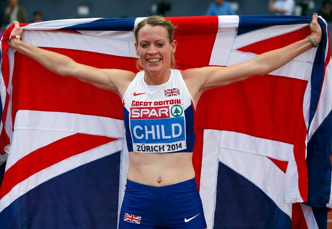 Elidh Child of Britain celebrates winning the women's 400 metres hurdles final during the European Athletics Championships in Zurich August 16, 2014. REUTERS/Phil Noble (