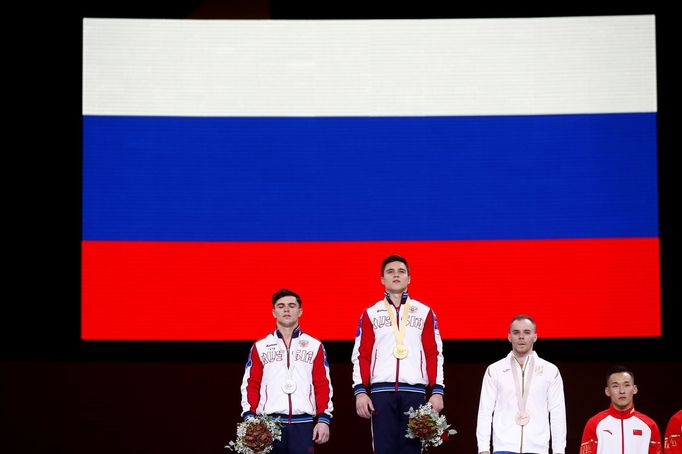 Artistic Gymnastics - 2019 World Artistic Gymnastics Championships - Men's All-Around Final - Hanns-Martin-Schleyer-Halle, Stuttgart, Germany - October 11, 2019   Gold me