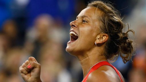 Barbora Zahlavova Strycova of the Czech Republic celebrates winning a second set tie-break against Eugenie Bouchard of Canada during their women's single match at the 201