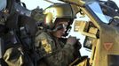 Britain's Prince Harry wears his monocle gun sight as he sits in his Apache helicopter in Camp Bastion, southern Afghanistan in this photograph taken November 2, 2012, and released January 21, 2013. The Prince, who is serving as a pilot/gunner with 662 Squadron Army Air Corps, is on a posting to Afghanistan that runs from September 2012 to January 2013. Photograph taken November 2, 2012. REUTERS/John Stillwell/Pool (AFGHANISTAN - Tags: MILITARY POLITICS SOCIETY ROYALS CONFLICT) Published: Led. 21, 2013, 9:05 odp.