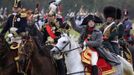 Participants in period costume re-enact the battle of Borodino during anniversary celebrations at the Borodino museum-reserve outside Moscow September 2, 2012. Russian President Vladimir Putin made a rousing call for unity among Russia's diverse ethnic and religious groups on Sunday as he led commemorations of a battle 200 years ago that led to the defeat of Napoleon Bonaparte. REUTERS/Sergei Karpukhin (RUSSIA - Tags: ANNIVERSARY POLITICS CONFLICT) Published: Zář. 2, 2012, 8:33 odp.